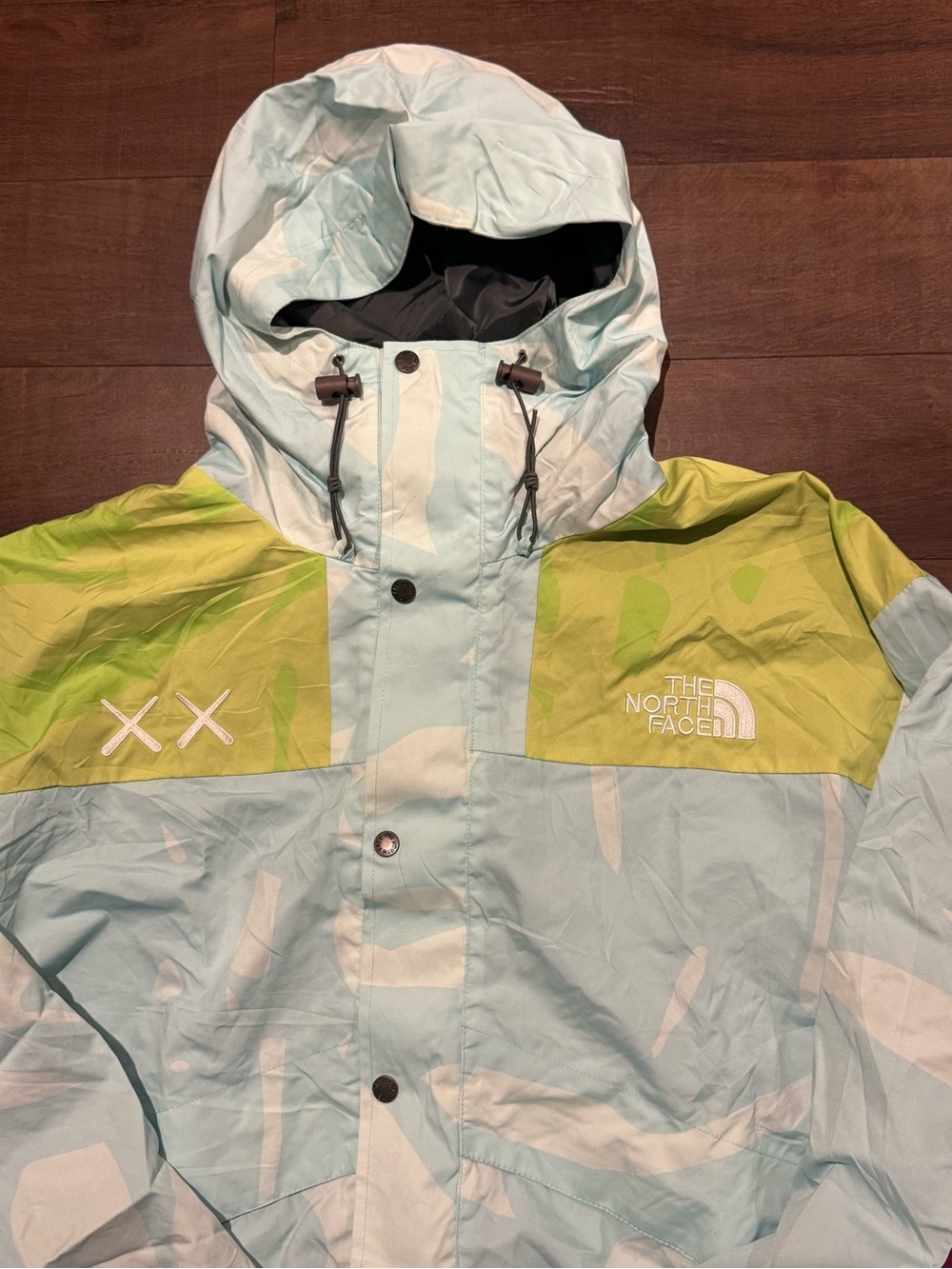 The North Face Light Blue & Lime Hooded Raincoat kaws x tnf